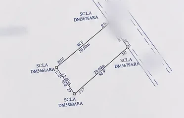Close-up of a cadastral survey plan showing a plot boundary with beacon marks